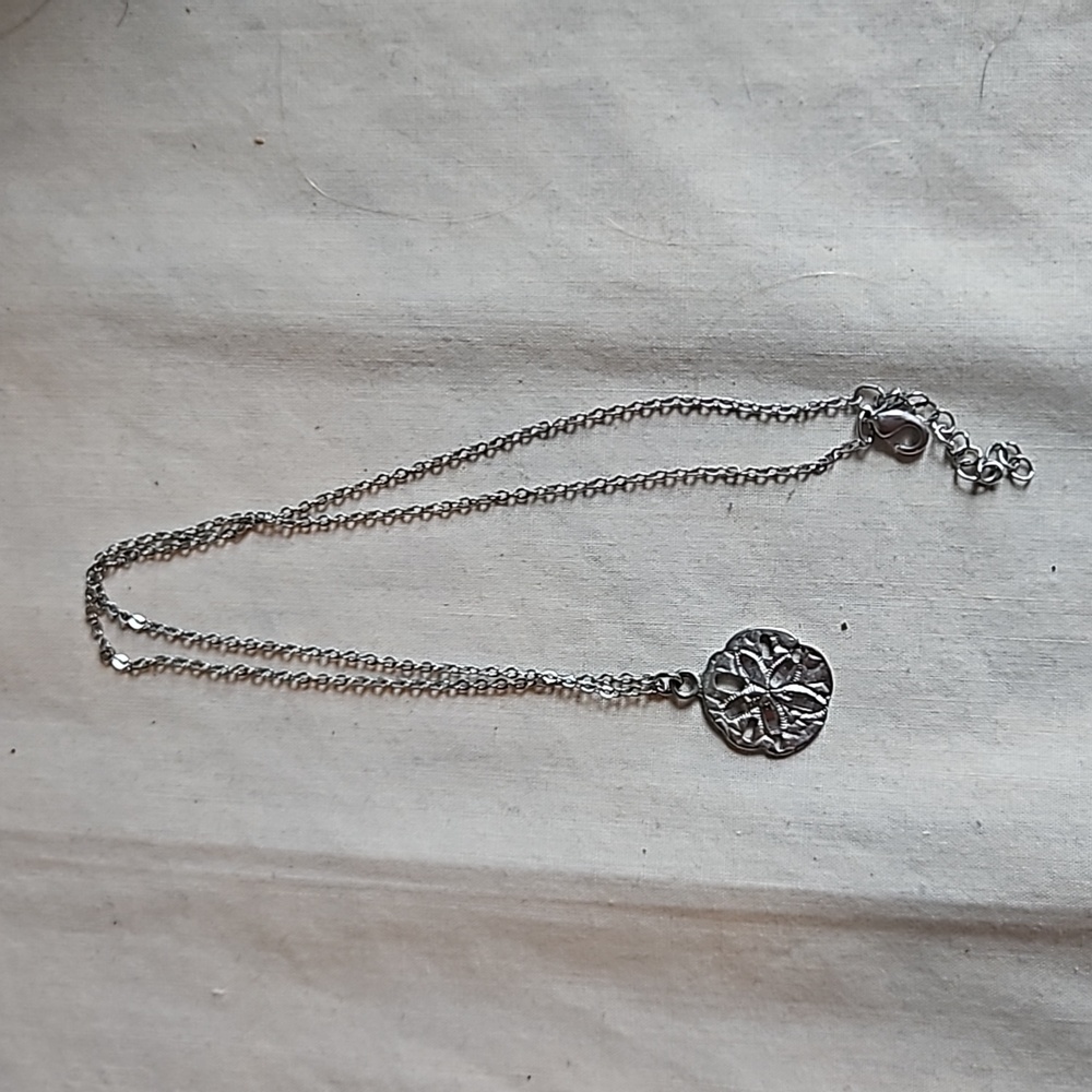 Silver sand dollar charm necklace